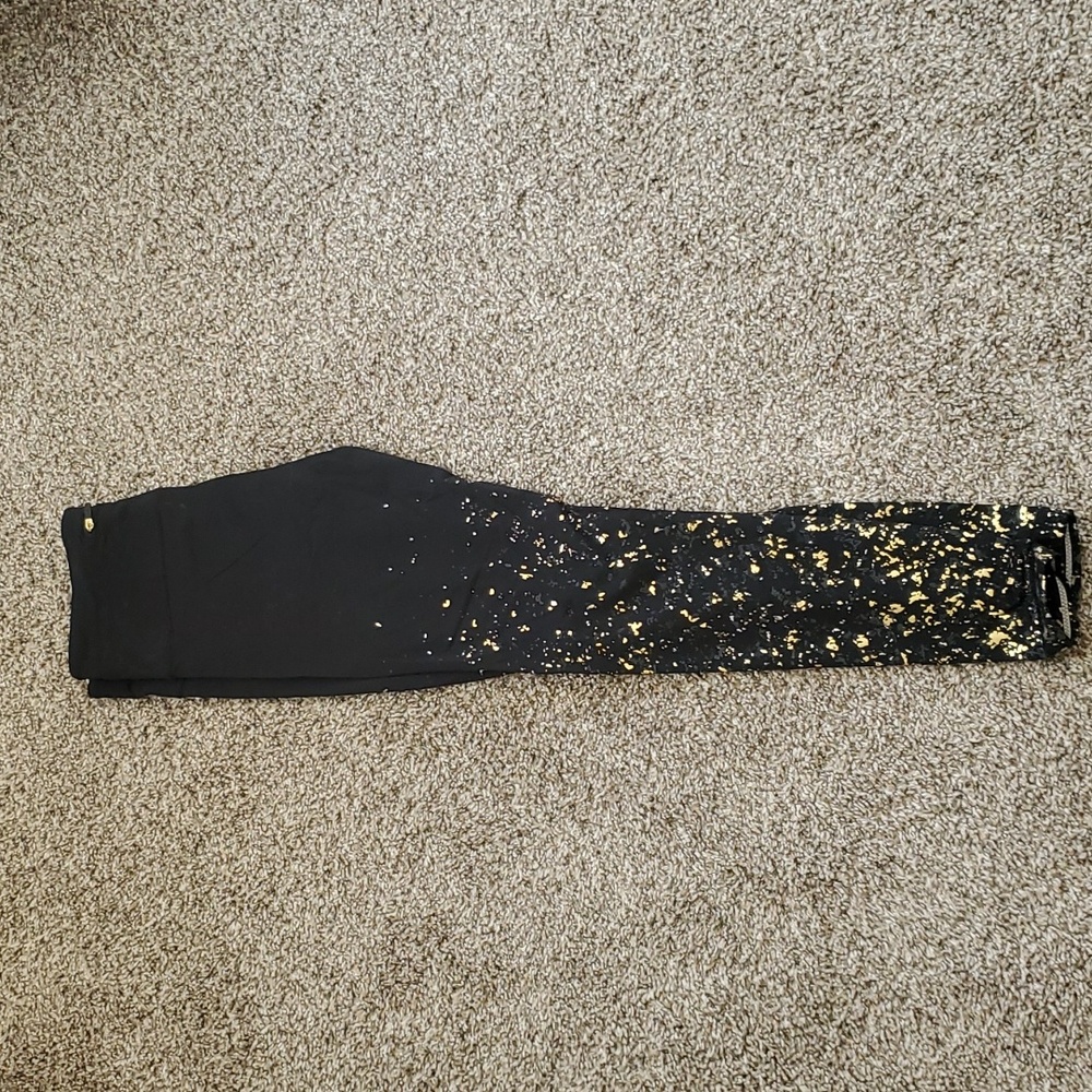 Lululemon black leggings with gold spots